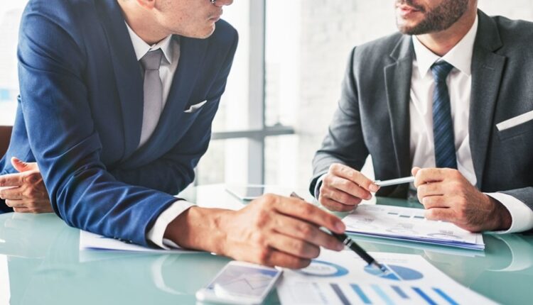 Business Colleagues Meeting Paperwork Concept